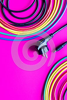 Concept network internet cable on pink background close up