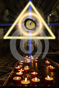 Concept occultism astrology magic. Candles burning in a dark church