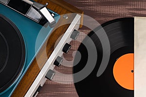 Concept of old equipment for playing musical vinyl records, close-up