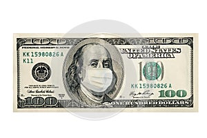 Concept, one hundred dollars with Benjamin Franklin masked by a virus. Coronavirus protection. Horizontal frame photo