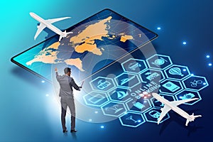 Concept of online airtravel booking with businessman