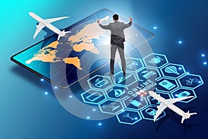 Concept of online airtravel booking with businessman