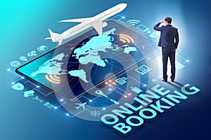 Concept of online airtravel booking with businessman