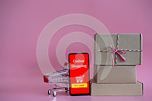 Concept online Sopping. boxes and shopping bag with Smartphone Online