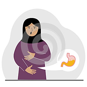 The concept of pain in the abdomen. The arab woman holds his stomach with both hands. Problems with the stomach or