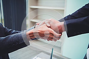 Concept of partnership - handshake business partners Successful team