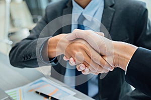 Concept of partnership - handshake business partners Successful team leader entrepreneurship