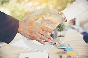 Concept of partnership - handshake business partners.Trust business