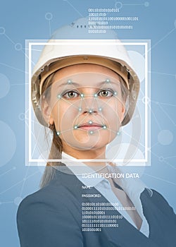 Concept of person identification. Beautiful builder in helmet. Face with lines