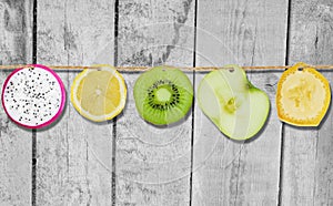 Concept photo of fruit on a rope