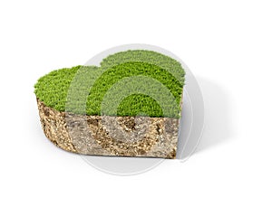 Concept of piece of ground and grass in a shape of heart, isolated on white background,