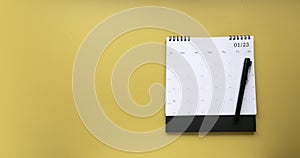 Concept of plan a monthly calendar for meetings or manage your daily activities.Yellow banner. Copy space