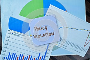 Concept of Policy Violation write on sticky notes isolated on Wooden Table
