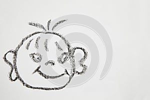 Concept for a positive attitude with hand drawn fat tricky child face on white background. Psychology, emotion, smiley