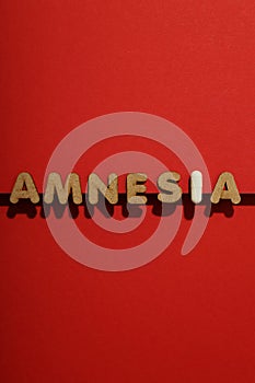 Concept of problems with memory, amnesia disease on red background