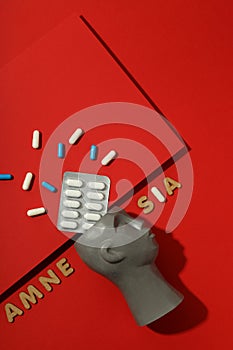 Concept of problems with memory, amnesia disease on red background