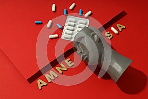 Concept of problems with memory, amnesia disease on red background