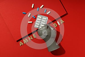 Concept of problems with memory, amnesia disease on red background