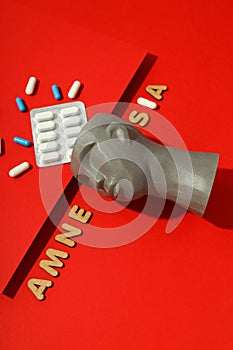 Concept of problems with memory, amnesia disease on red background