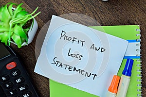Concept of Profit and Loss Statement write on sticky notes isolated on Wooden Table