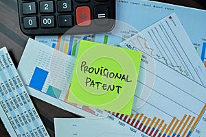 Concept of Provisional Patent write on sticky notes isolated on Wooden Table