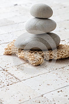 Concept of purity, beauty and massage over feng shui limestone