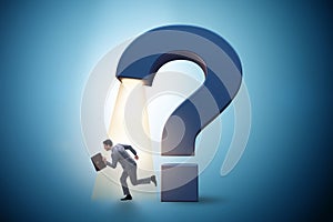 Concept with question mark and businessman