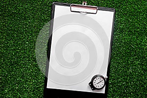 Concept refereeing sport on green background top view mock up