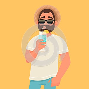 Concept of relaxation and summer vacation. A man in sunglasses is drinking a cocktail. Rest by the sea