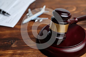 The concept of revoking a flight license next to a judge hammer