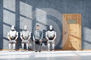 Concept Robots and artificial intelligence are taking away jobs. Robots and humans are sitting waiting for a job interview. photo