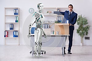 Concept of robots replacing humans in offices