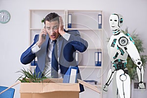 Concept of robots replacing humans in offices