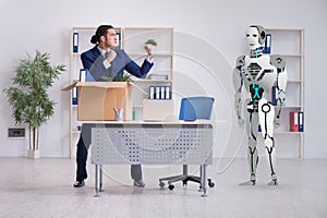 Concept of robots replacing humans in offices