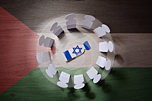 Concept of rounding up Israeli by Palestinians forces with cutouts