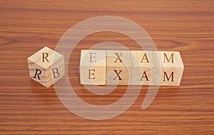 Concept of RRB exam conducted in India for recruitment, RRB Exam on Wooden block letters photo