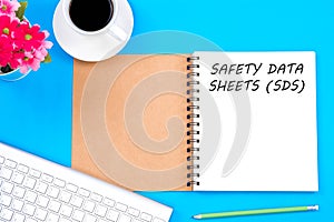 Concept SAFETY DATA SHEETS SDS message with modern workplace o