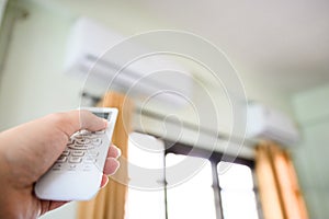 Hand push down button air conditioner remote and turning off working machine