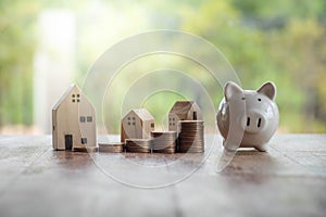 Concept of saving money to buy a house for the future