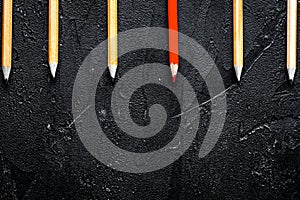 Concept selection options with pencils on dark background top vi