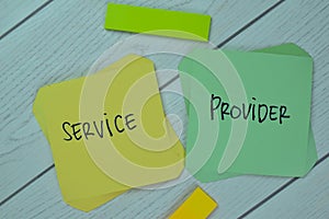 Concept of Service Provider write on sticky notes isolated on Wooden Table