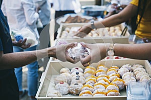 The concept of sharing food to hungry and starving people : Volunteers are handing out food to the poor