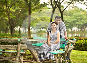 Concept shot of Asian young couple in love .