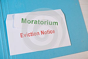 Concept showing Moratorium for evictions by showing eviction notice on table during coronavirus or covid-19 pandemic photo