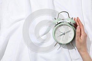 Concept of sleep and wake up with alarm clock