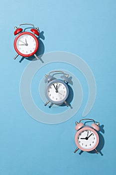 Concept of sleep and wake up with alarm clocks