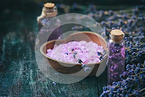 Concept spa therapy. Fresh lavender blossoms with Natural handmade lavender oil, sea salt.