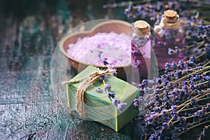 Concept spa therapy. Natural handmade soap, fresh lavender blossoms with Natural handmade lavender oil, sea salt.
