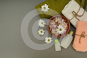 Concept for spa treatments with flowers and towels