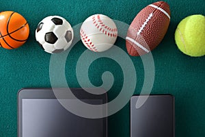 Concept of sports events and technology with devices and balls